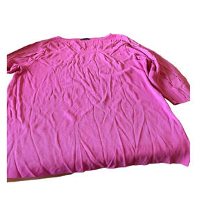 Cyrus top, pink with cutouts on the top portion and both sleeves.